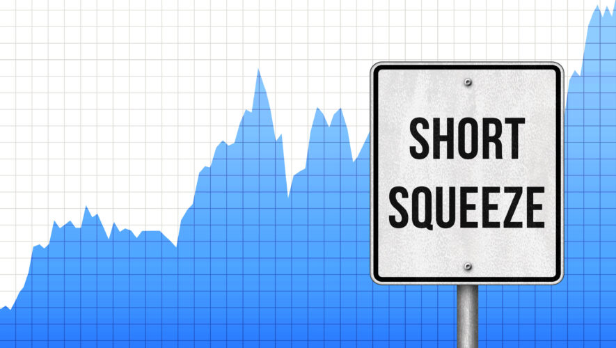 "Short squeeze" sign with stock market chart in background